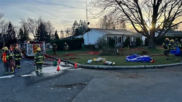 A home on Montcalm Street in Pincourt is engulfed in flames  