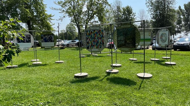 An outdoor exhibition at Plage de Saint-Zotique