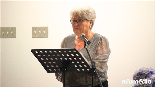 Portrait de femme : Huguette Ouellet, donner au suivant